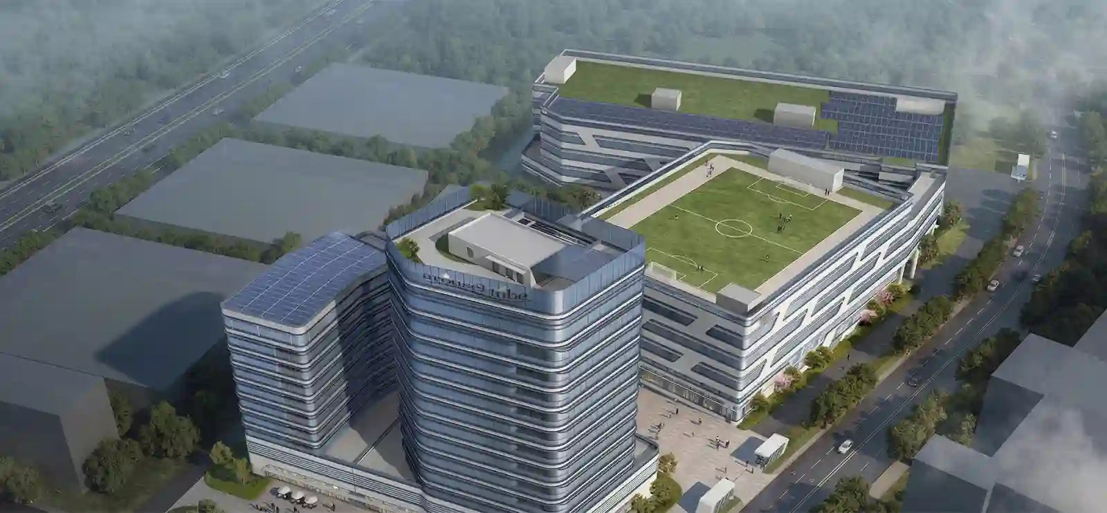 Modern office of arousellube building with green roof and surrounding infrastructure