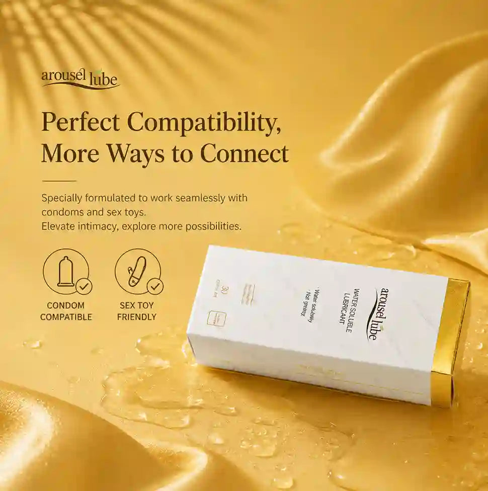 A boxed product labeled 'arousel
lube' and 'Perfect Compatibility, More Ways to Connect' placed on a glossy gold satin background with water droplets. The box is white with gold trim and black text.