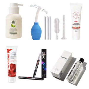 Collection of arousal lubes and cleaning kit products on a white background