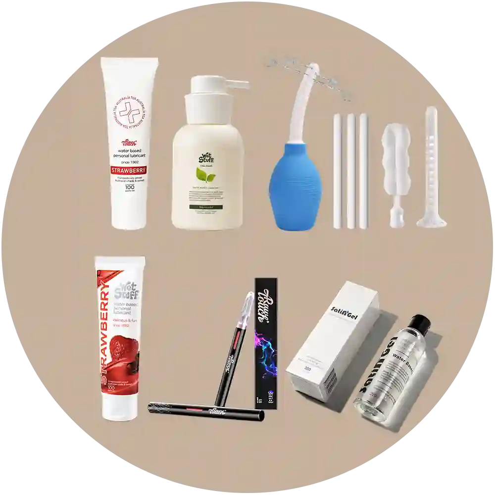 Collection of arousal lubes and cleaning kit products on a white background