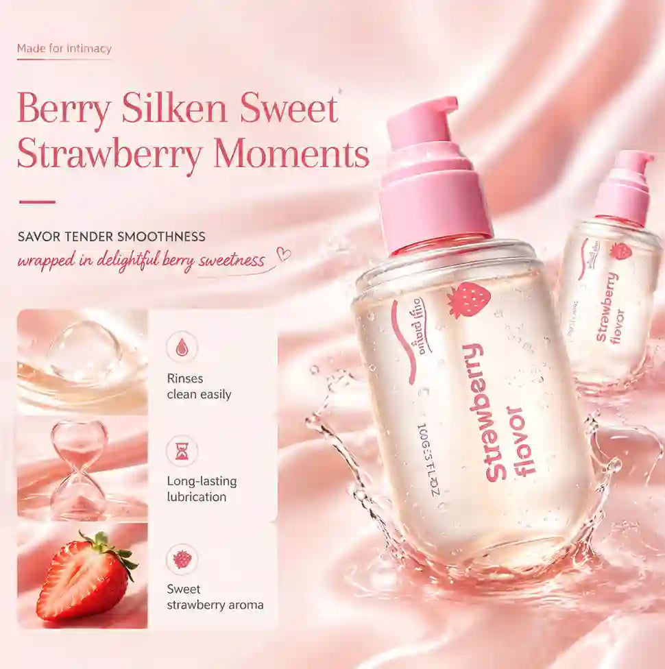 Berry Silken Sweet Strawberry Moments strawberry lubricant bottle with a pink pump dispenser, shown alongside a smaller matching bottle on a pink satin background with promotional text and feature icons.
