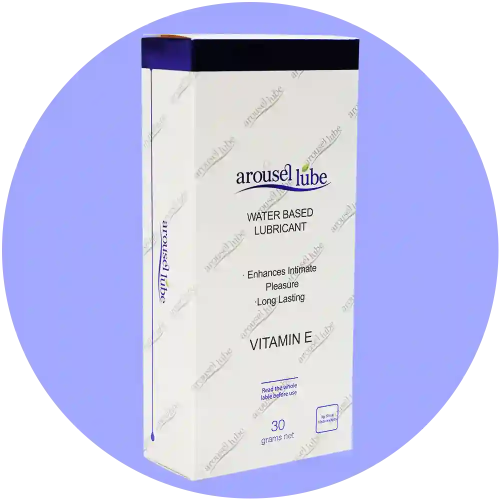 A box of Arouselube Water Based Lubricant, Vitamin E variant, 30 grams net. The packaging is white with a dark blue top band and purple accents, shown on a plain white background with diagonal watermarks.