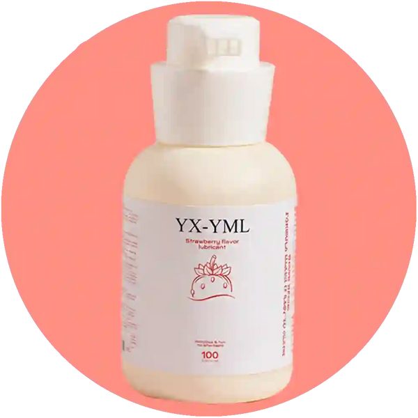 A bottle of YX-YML Strawberry Revive lubricant with a white pump dispenser and white label, set against a coral pink circular background.