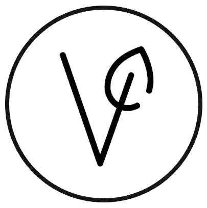 Circular logo with a stylized symbol of leaf inside shows purity totally herbs fomaly