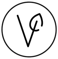 Circular logo with a stylized symbol of leaf inside shows purity totally herbs fomaly