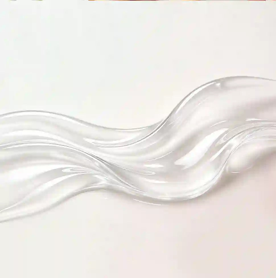 Clear, wavy glass object on a light beige background