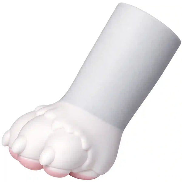 A novelty novelty cup shaped like a stylized paw print, featuring a matte white body with a soft pink accent on the paw pads, shown on a solid white background.