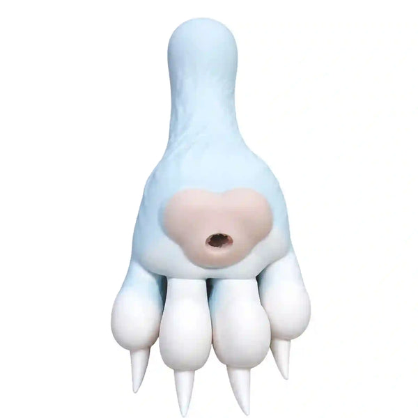 A novelty prank toy shaped like a monster claw hand sex device, featuring a pale blue body, a beige mouth opening, and white claws, isolated on a white background.