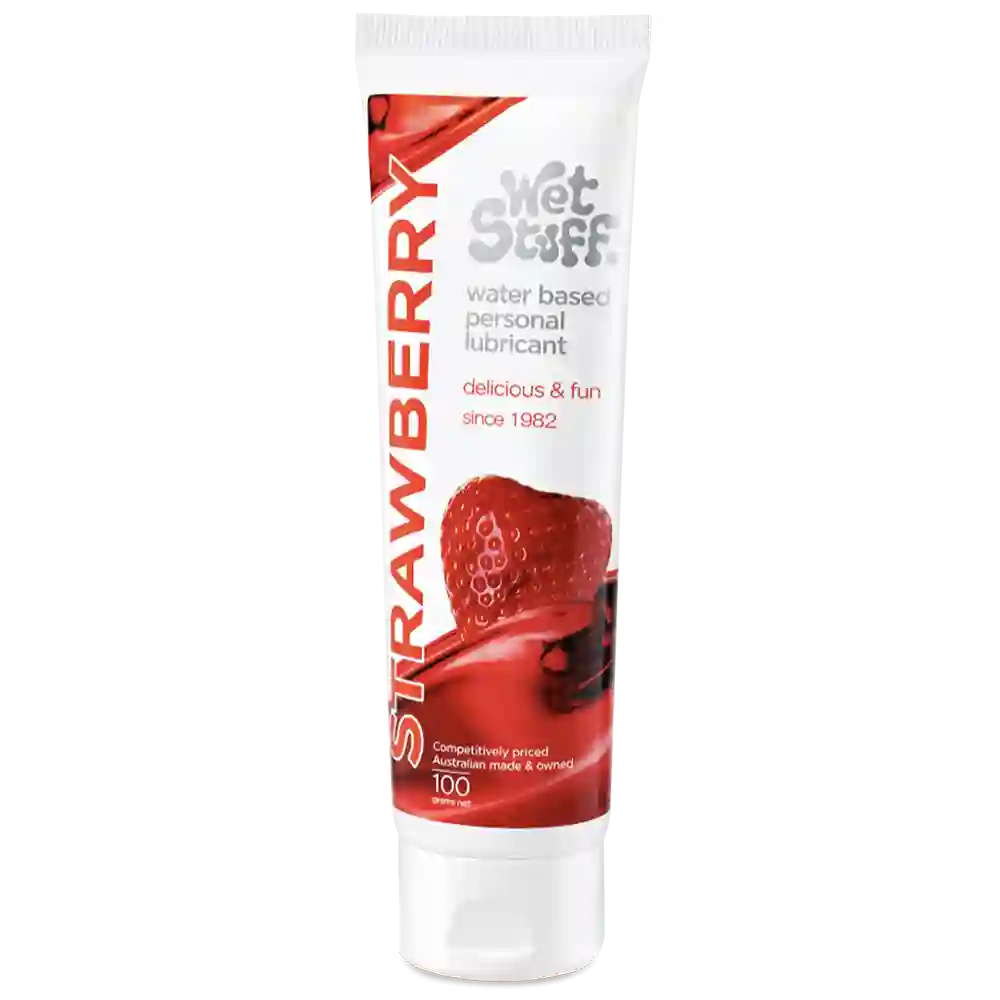 Tube of strawberry-flavored personal coupling lubricant on a white background