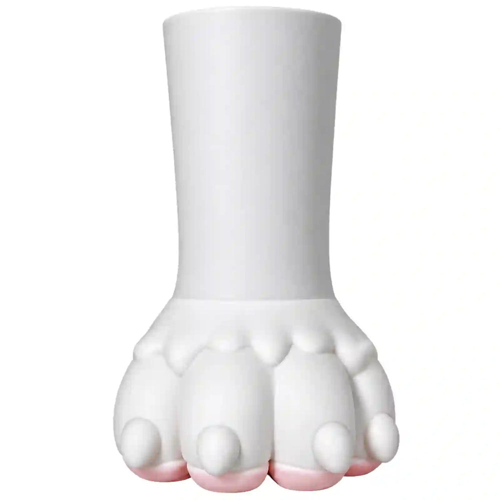 A white ceramic or porcelain novelty object shaped like a stylized claw or paw with a tall cylindrical upper section and five rounded lower sections, shown on a plain white background.